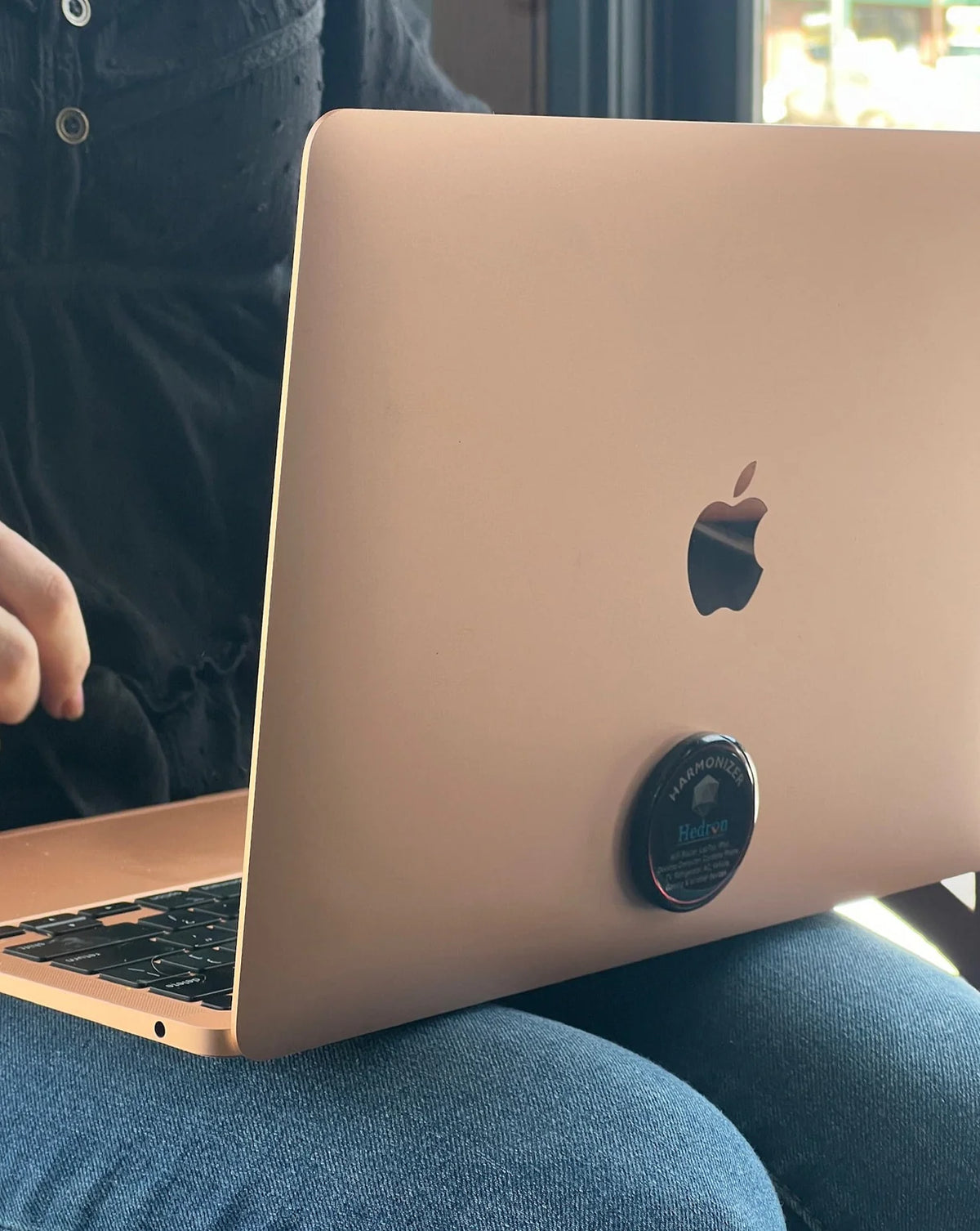 Laptop with a Hedron EMF protection device on the back
